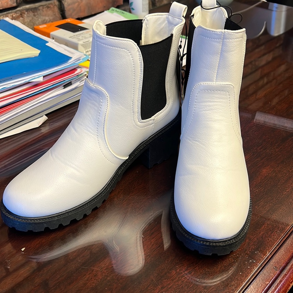 Never worn, brand new with tags.